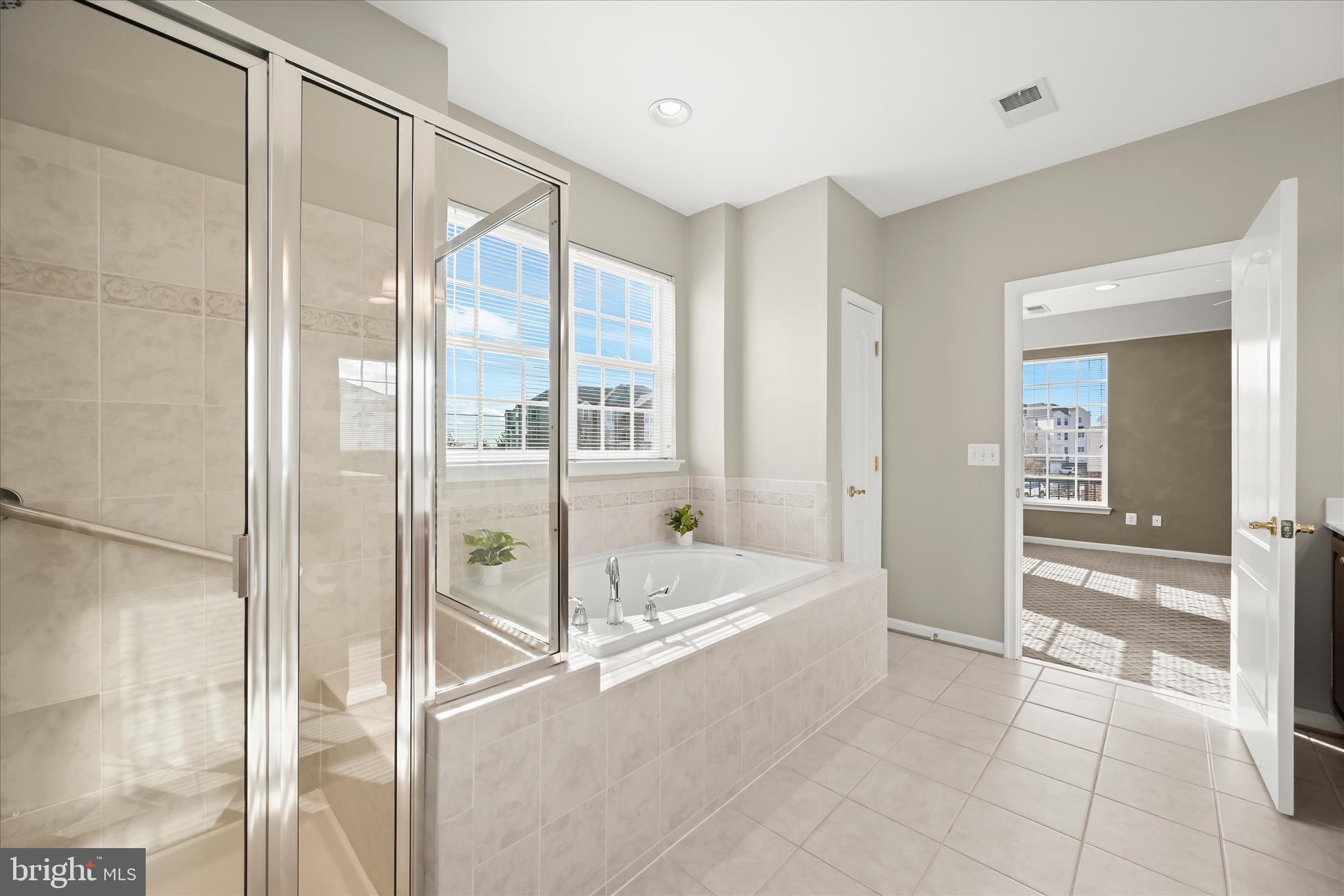 7305 Maplecrest Road, Unit 207 Elkridge, MD 21075 - Photo 28 of 50 a bathroom with a tub and shower