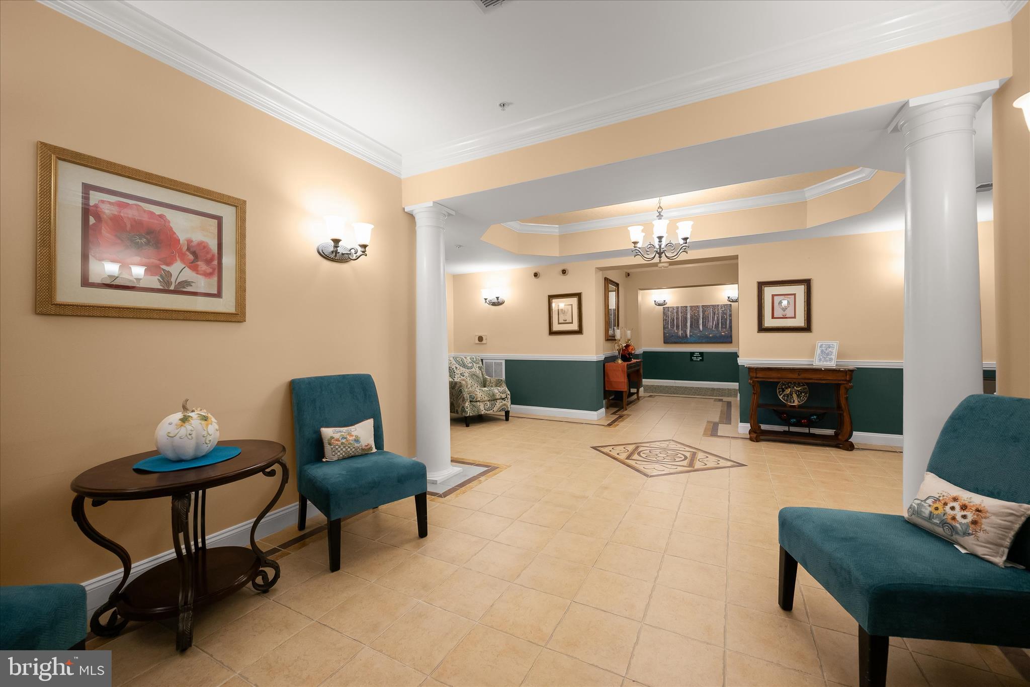 7305 Maplecrest Road, Unit 207 Elkridge, MD 21075 - Photo 3 of 50 a living room with furniture and a dining table