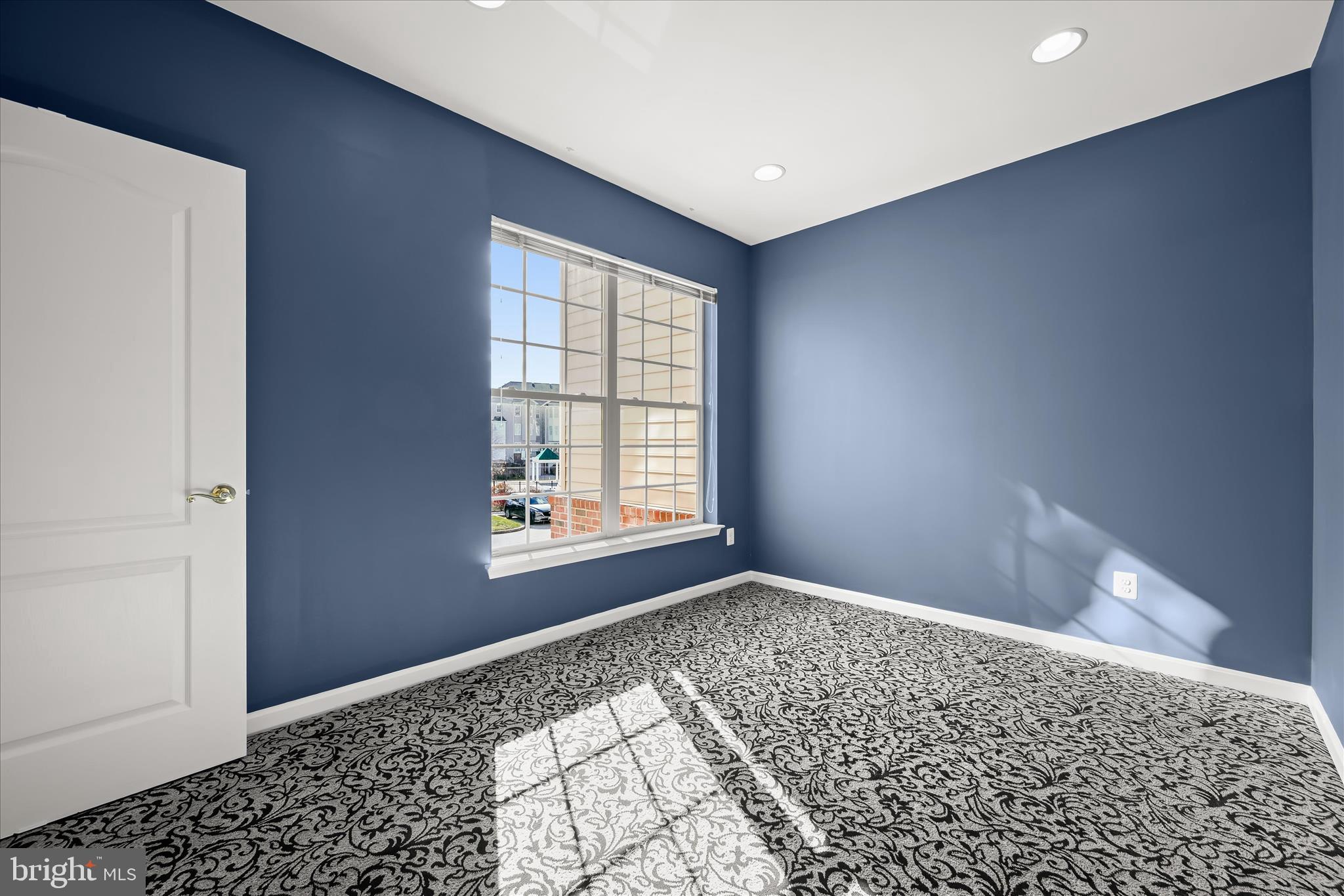 7305 Maplecrest Road, Unit 207 Elkridge, MD 21075 - Photo 34 of 50 a view of an empty room and window