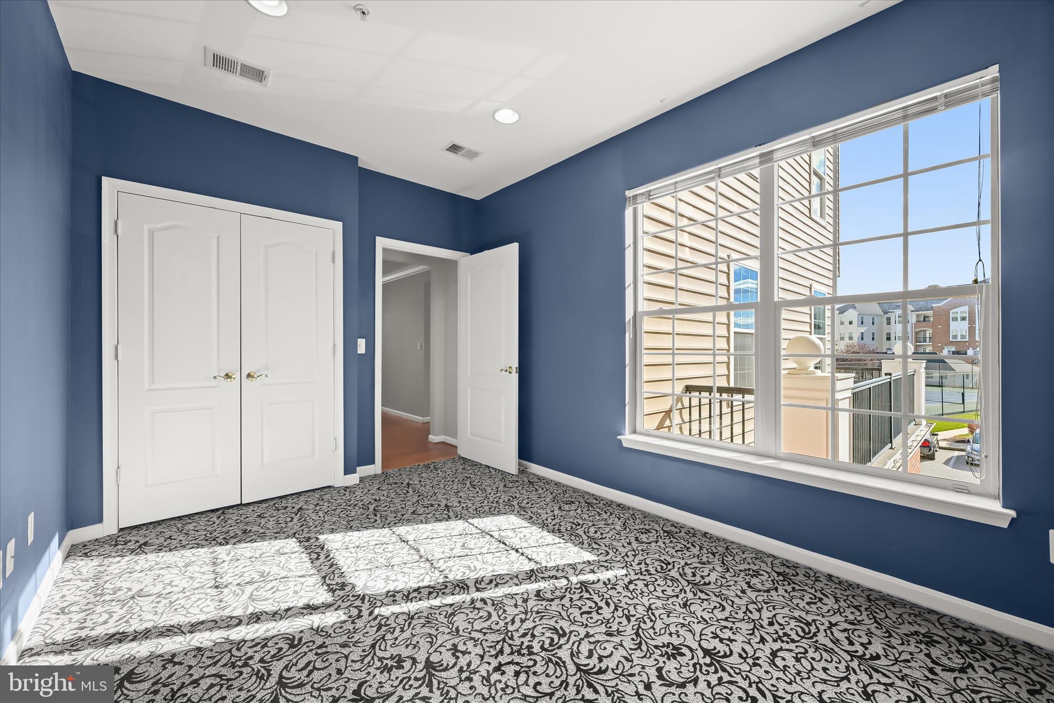 7305 Maplecrest Road, Unit 207 Elkridge, MD 21075 - Photo 35 of 50 a view of an empty room and window