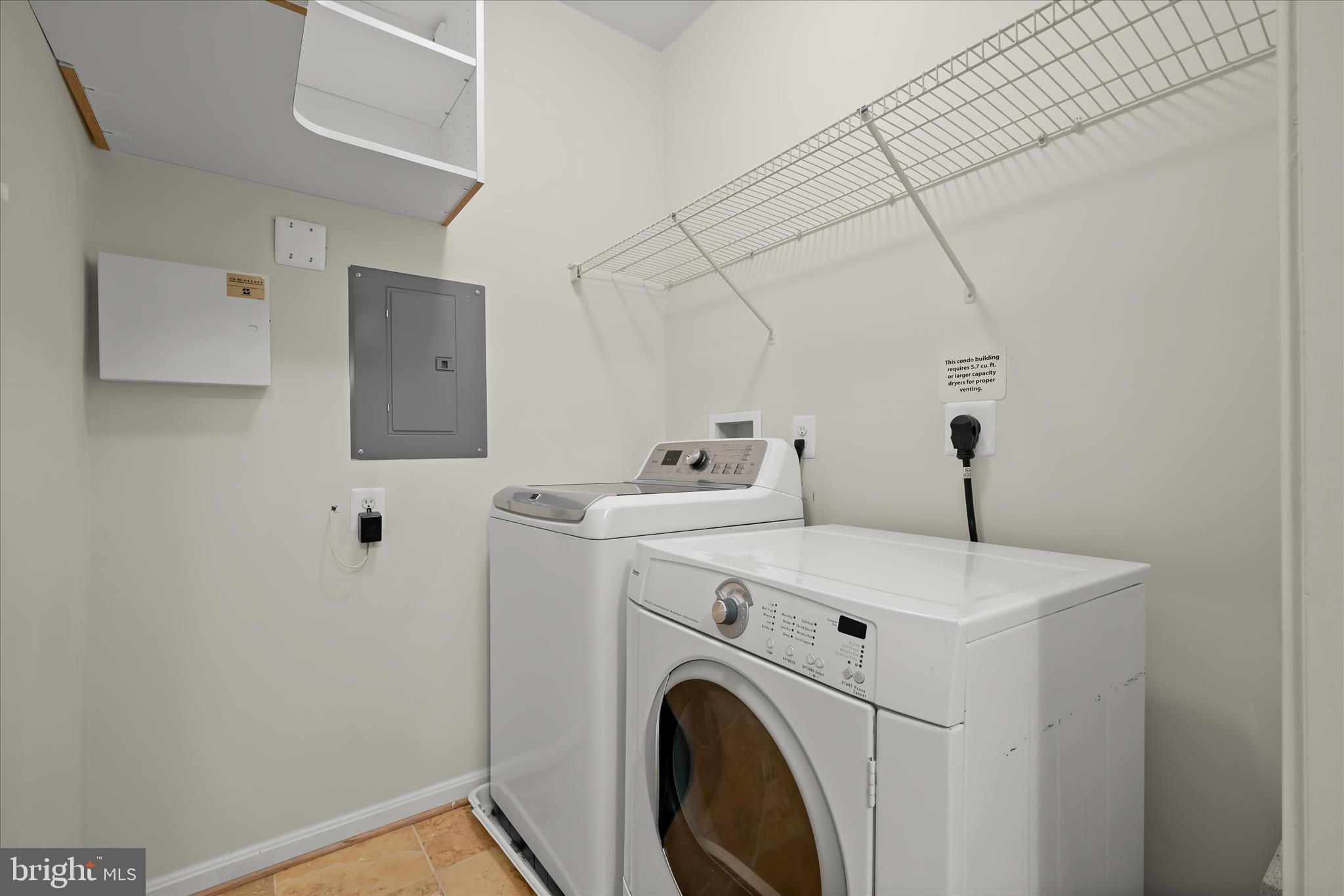 7305 Maplecrest Road, Unit 207 Elkridge, MD 21075 - Photo 40 of 50 a utility room with dryer and washer