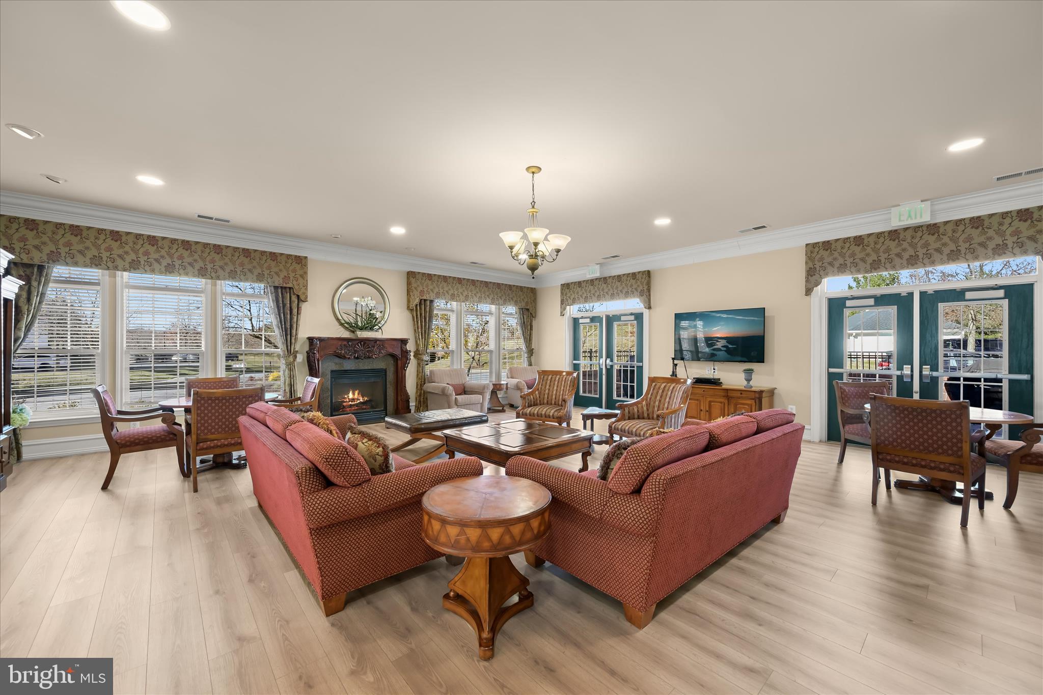 7305 Maplecrest Road, Unit 207 Elkridge, MD 21075 - Photo 44 of 50 a living room with fireplace furniture and a wooden floor