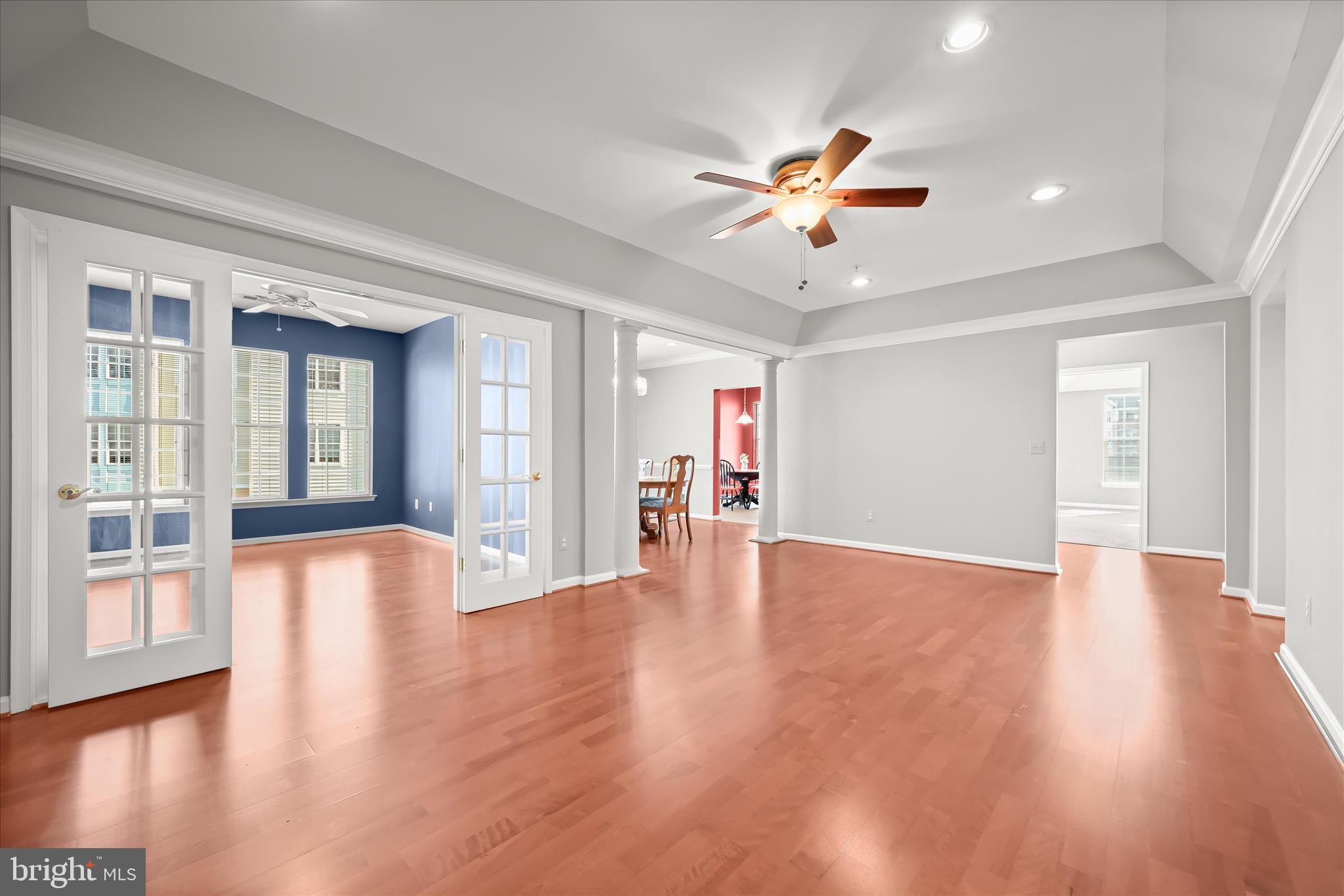 7305 Maplecrest Road, Unit 207 Elkridge, MD 21075 - Photo 49 of 50 a view of an empty room with window and wooden floor