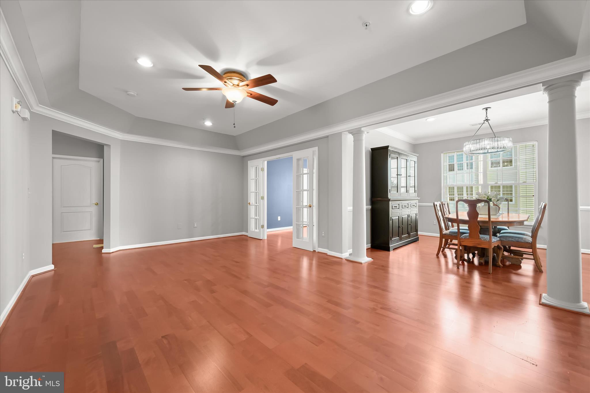 7305 Maplecrest Road, Unit 207 Elkridge, MD 21075 - Photo 6 of 50 a view of dining room with furniture and wooden floor
