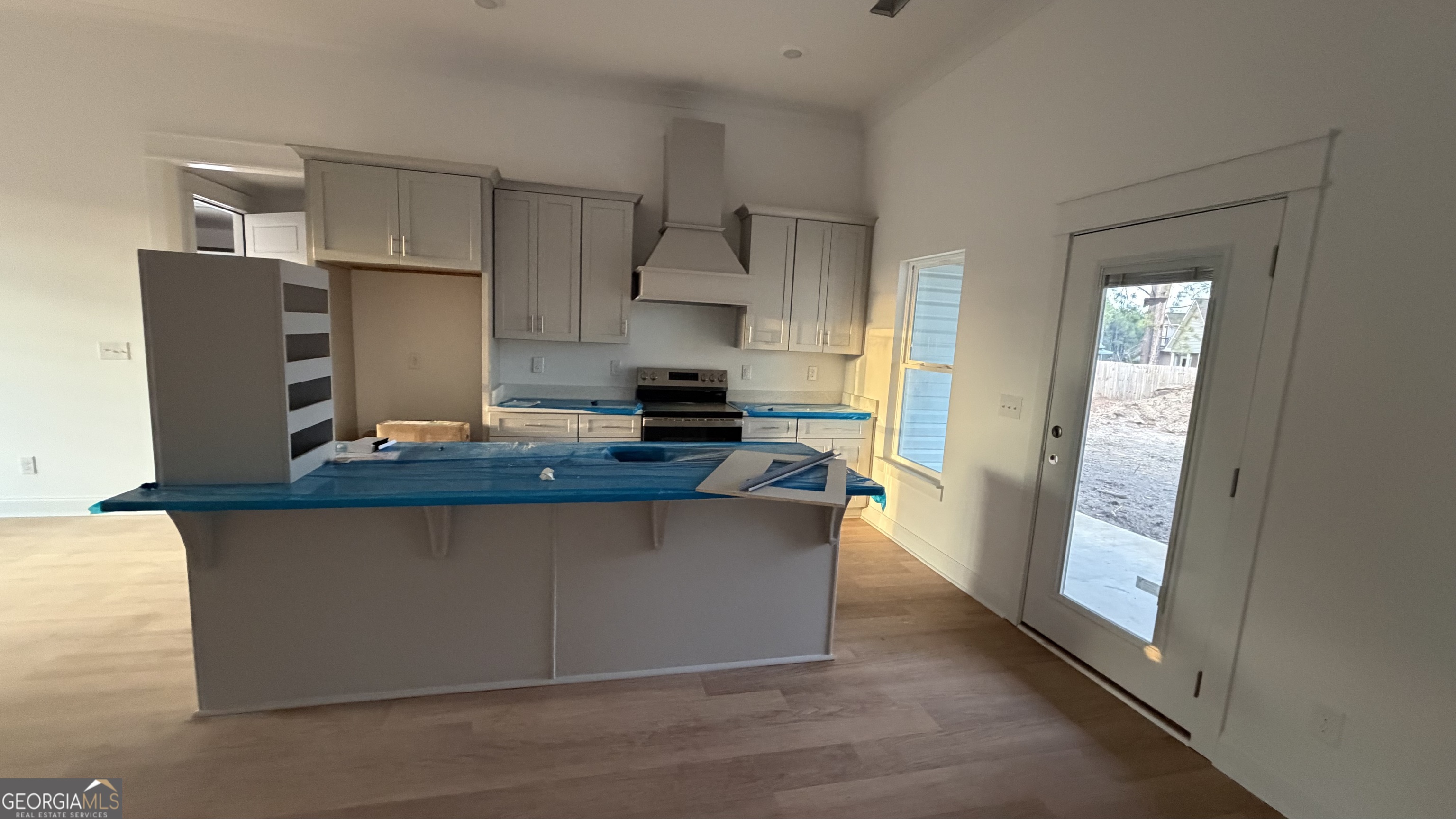 336 Mace Cannon Road Dublin, GA 31021 - Photo 4 of 18 a kitchen with stainless steel appliances granite countertop a refrigerator and a stove