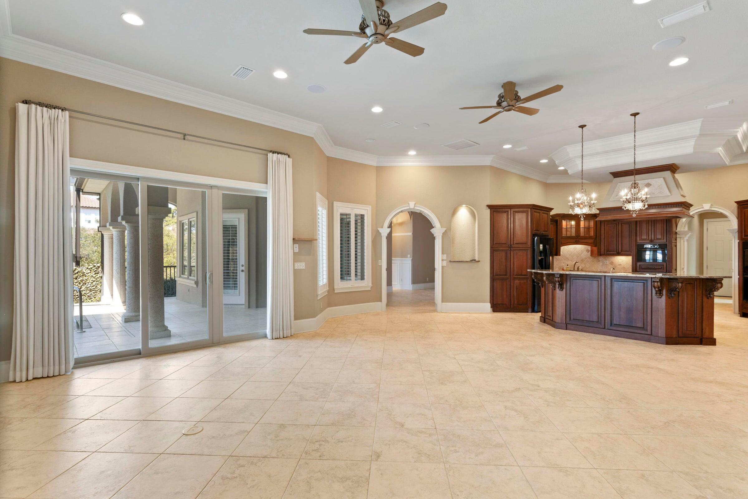 322 Emerald Ridge Santa Rosa Beach, FL 32459 - Photo 11 of 43 a view of a kitchen with a sink and a refrigerator