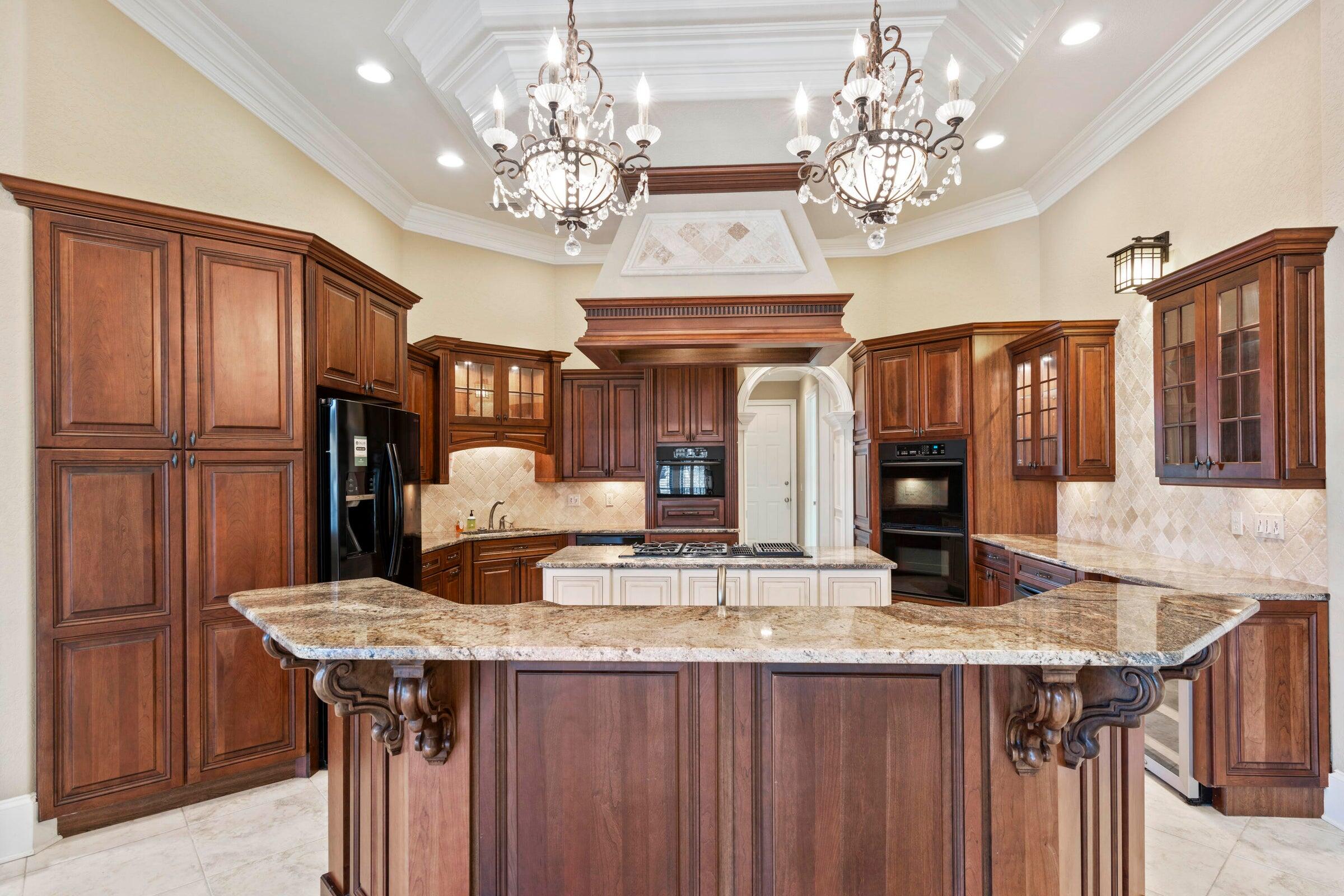 322 Emerald Ridge Santa Rosa Beach, FL 32459 - Photo 14 of 43 a kitchen with a table and chairs in it