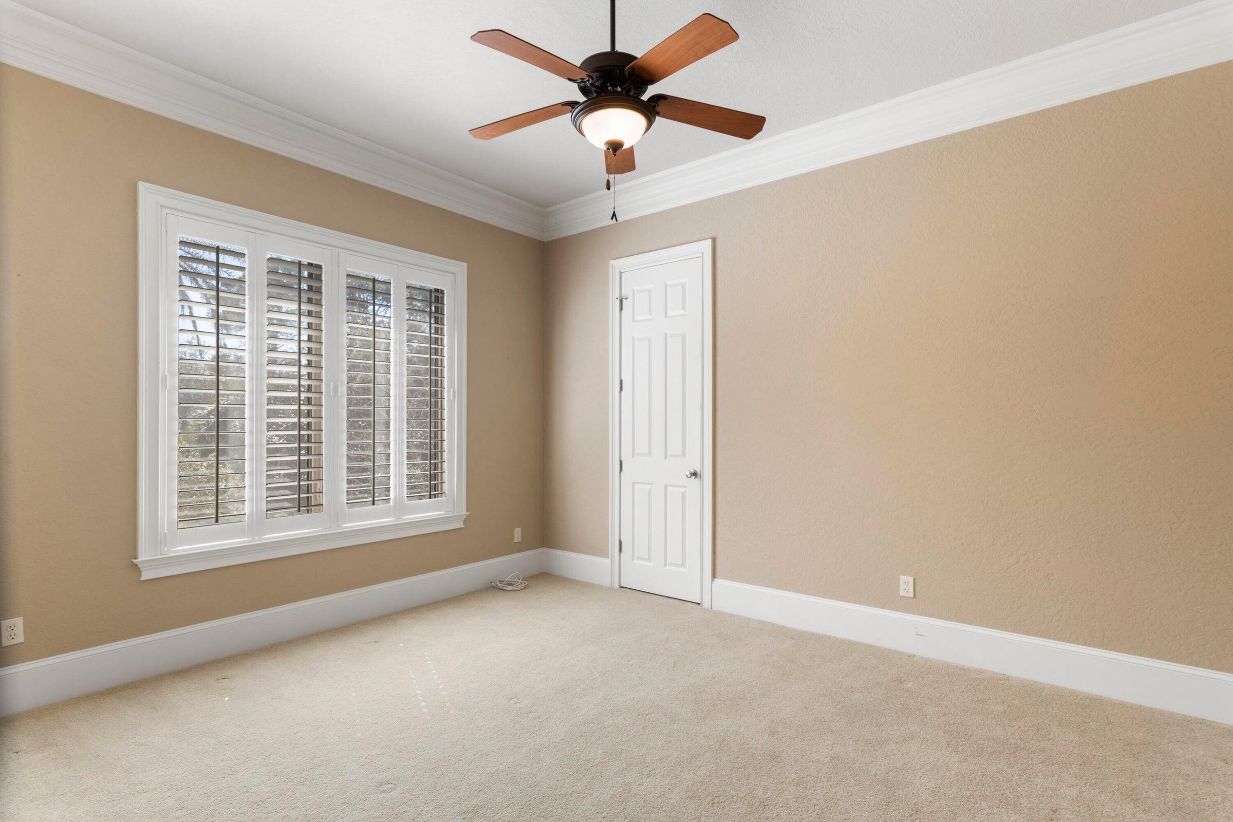 322 Emerald Ridge Santa Rosa Beach, FL 32459 - Photo 22 of 43 a view of a livingroom with a ceiling fan and window