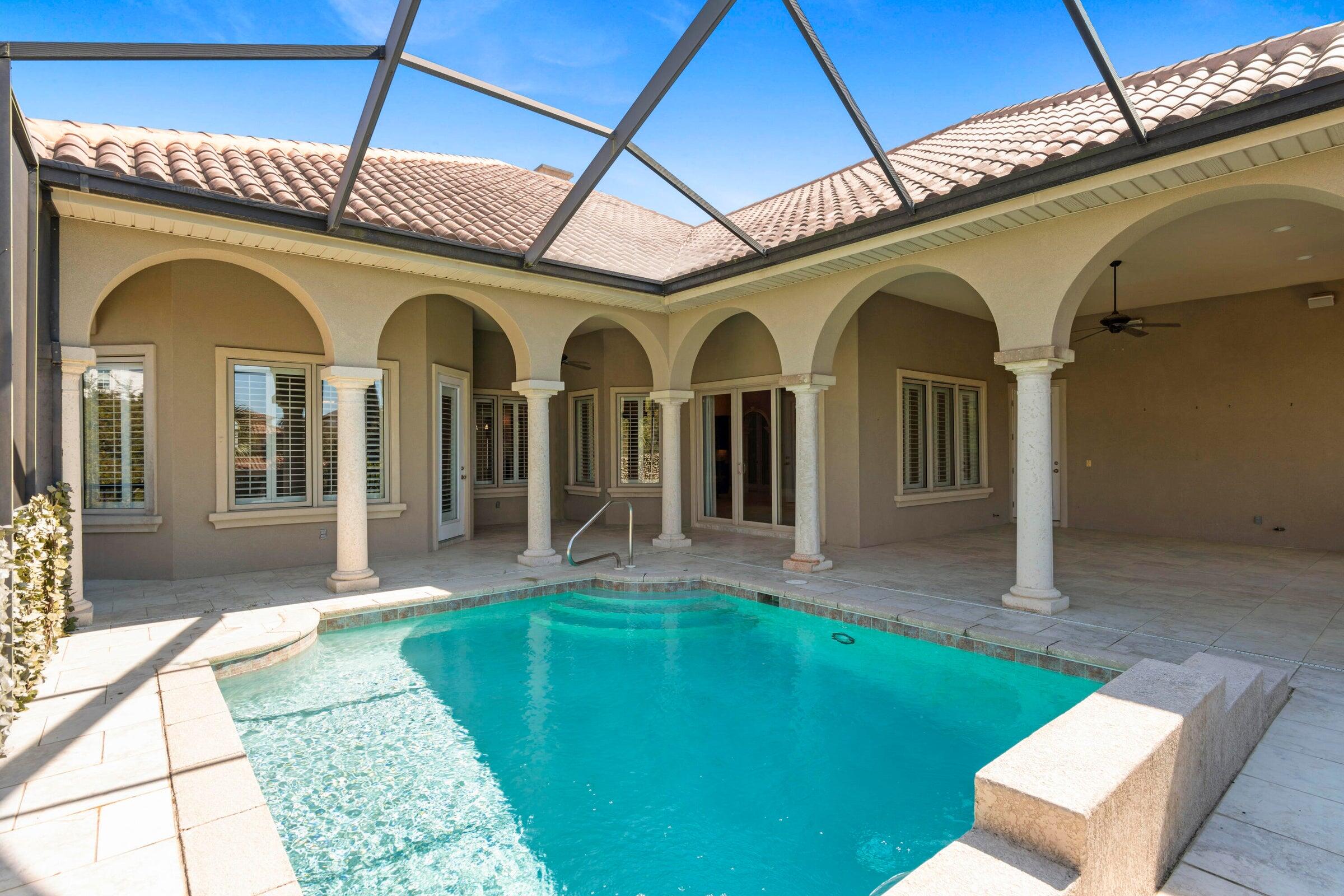 322 Emerald Ridge Santa Rosa Beach, FL 32459 - Photo 27 of 43 a front view of a house with a yard