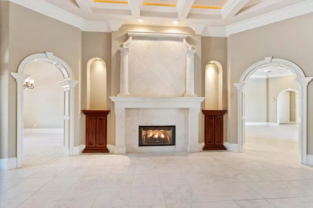 a view of a fireplace with washer and dryer
