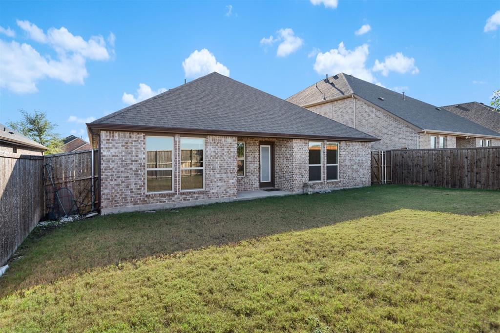 505 Maverick Street Anna, TX 75409 - Photo 37 of 39 a front view of a house with garden