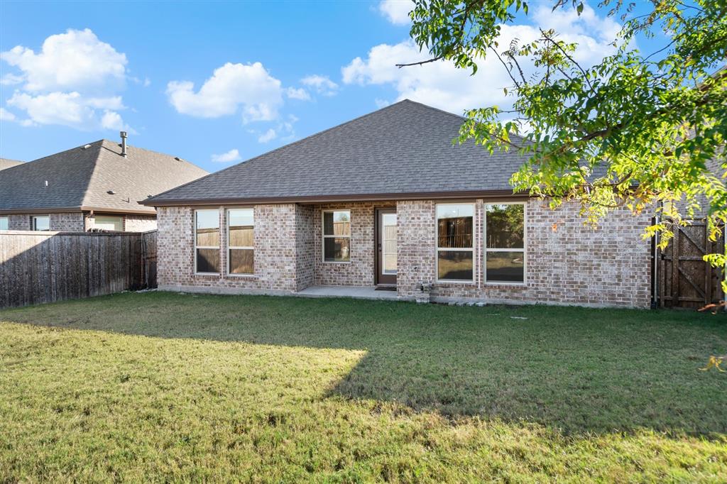505 Maverick Street Anna, TX 75409 - Photo 38 of 39 a front view of a house with a garden
