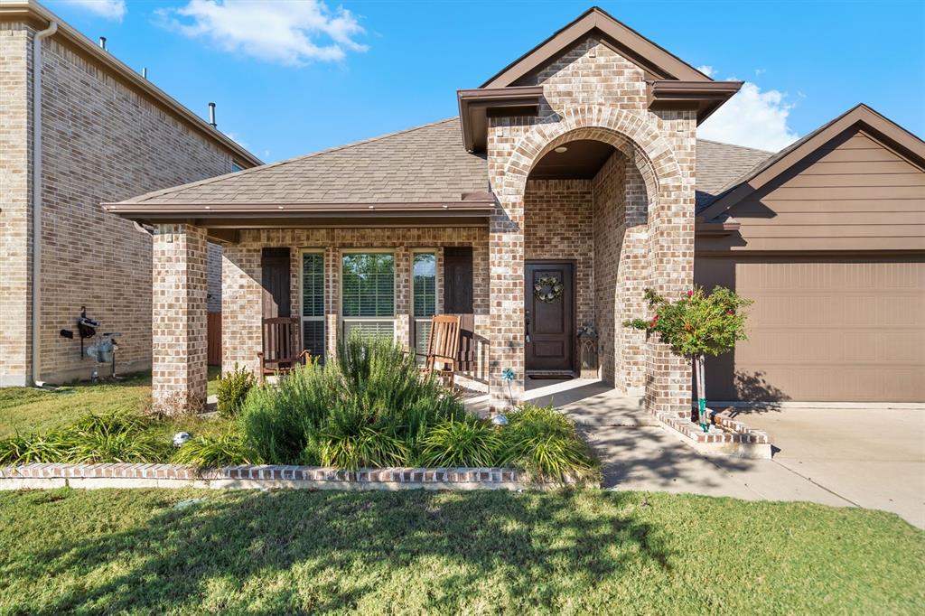 505 Maverick Street Anna, TX 75409 - Photo 8 of 39 a front view of a house with a yard
