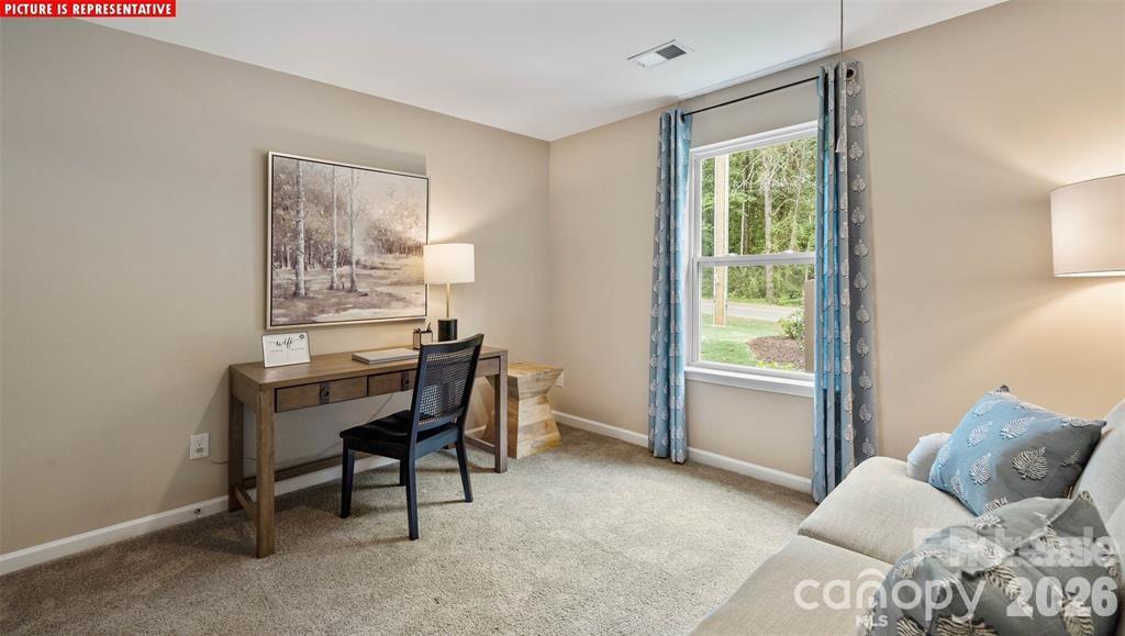 1700 Vanderlyn Street Monroe, NC 28112 - Photo 13 of 19 a workspace with furniture and a window