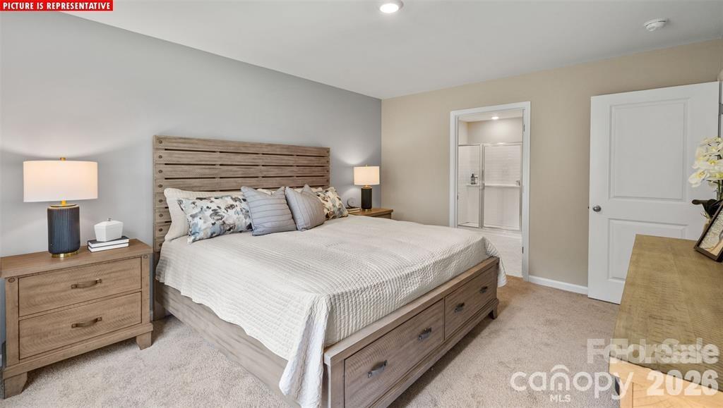 1700 Vanderlyn Street Monroe, NC 28112 - Photo 15 of 19 a bed room with a bed and a night stand