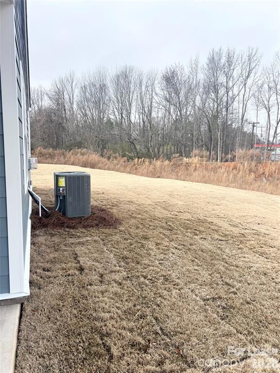 1700 Vanderlyn Street Monroe, NC 28112 - Photo 17 of 19 a view of a yard covered with snow in the yard