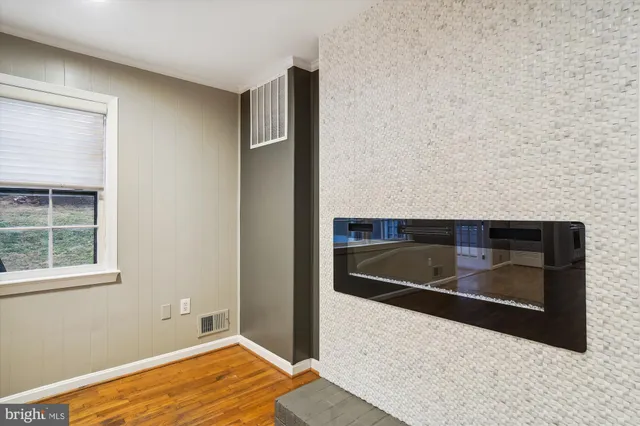 a kitchen with stainless steel appliances wooden cabinets and a granite counter tops