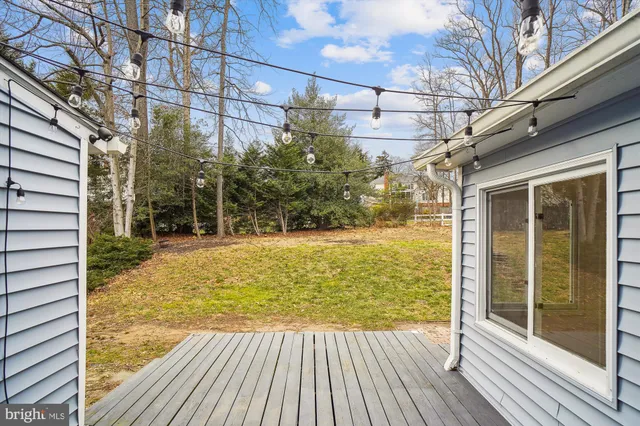a view of a room with a large window