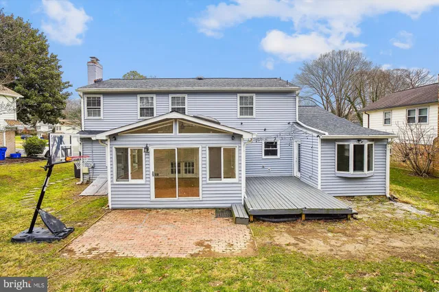 a view of washer and dryer with kitchen in the background