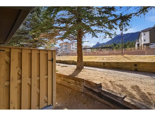 a view of a backyard of the house