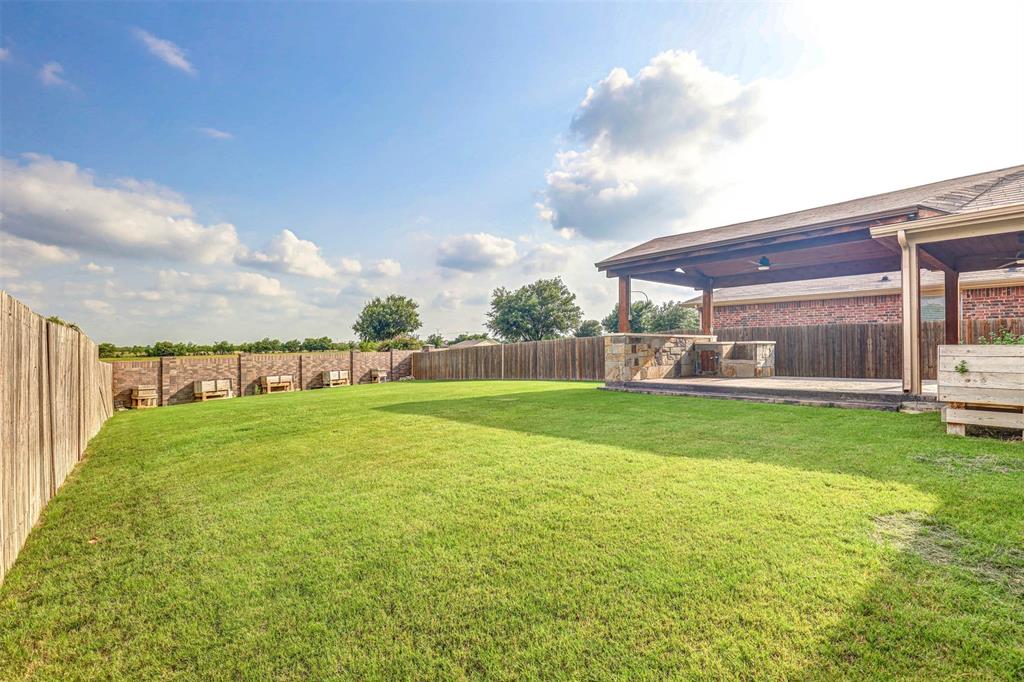 a view of a house with a big yard