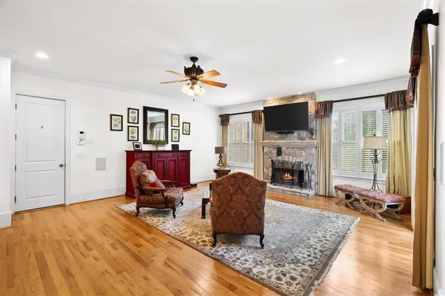 a view of balcony with wooden floor and potted plant