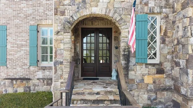 a view of a bathroom with a shower and a sink