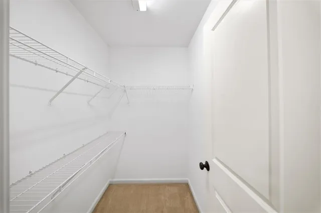 an aerial view of multiple houses with yard