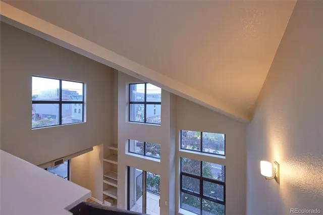 a view of a livingroom with furniture and window