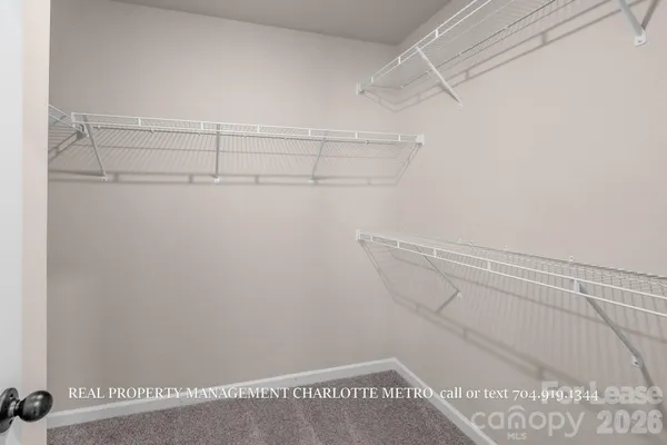 a view of a room that has a window in it