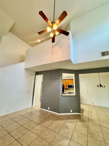 a view of a room with a fireplace