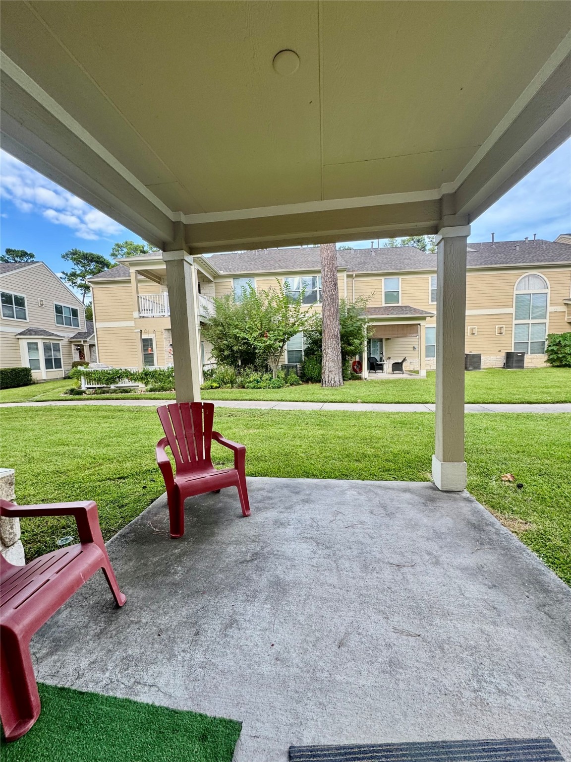 13600 Breton Ridge Street, Unit 36C Houston, TX 77070 - Photo 36 of 40 a view of a house with a yard