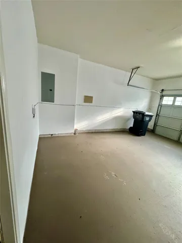 a kitchen with a stove microwave and refrigerator