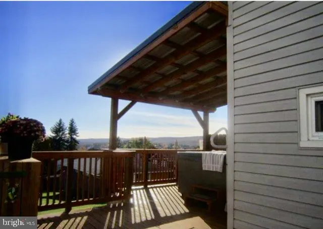 a view of balcony with furniture