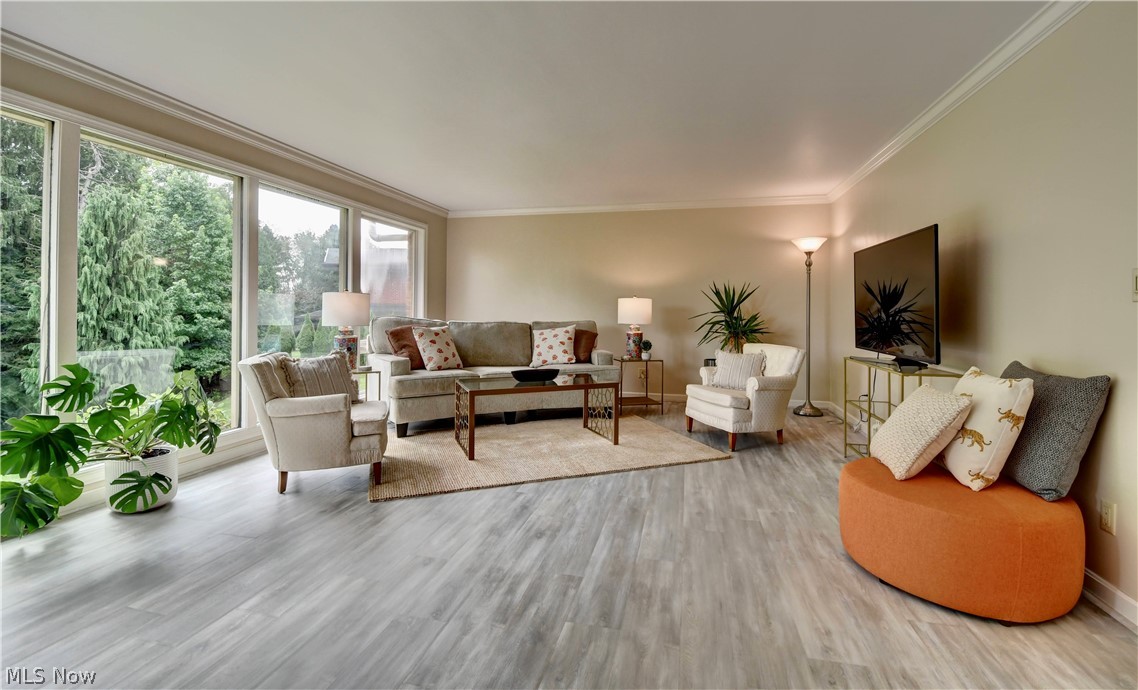 1157 Hilltop Road New Philadelphia, OH 44663 - Photo 13 of 40 Main Floor Living Room With Floor to Ceiling Windows