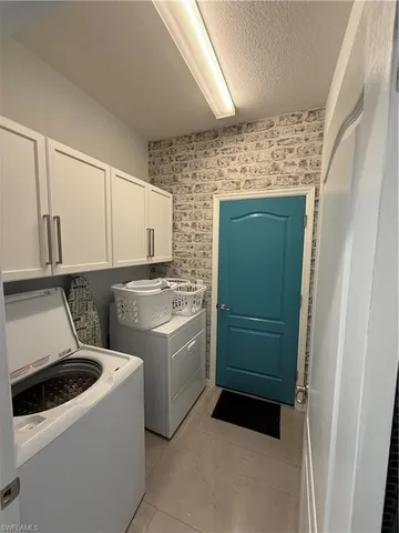 a kitchen with a stove and a refrigerator