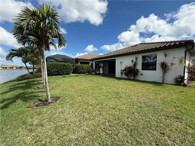 a house with garden in front of it