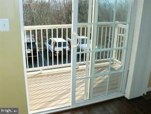 538 Rhapsody Court, Unit 538 Cockeysville, MD 21030 - Photo 16 of 30 Sunny balcony with serene views.