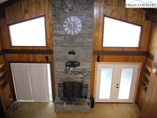 726 Pine Ridge Road Beech Mountain, NC 28604 - Photo 5 of 19 a view of a livingroom with furniture and a fireplace