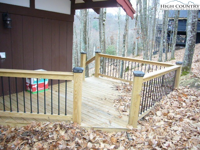 726 Pine Ridge Road Beech Mountain, NC 28604 - Photo 7 of 19 a balcony with view of outdoor space
