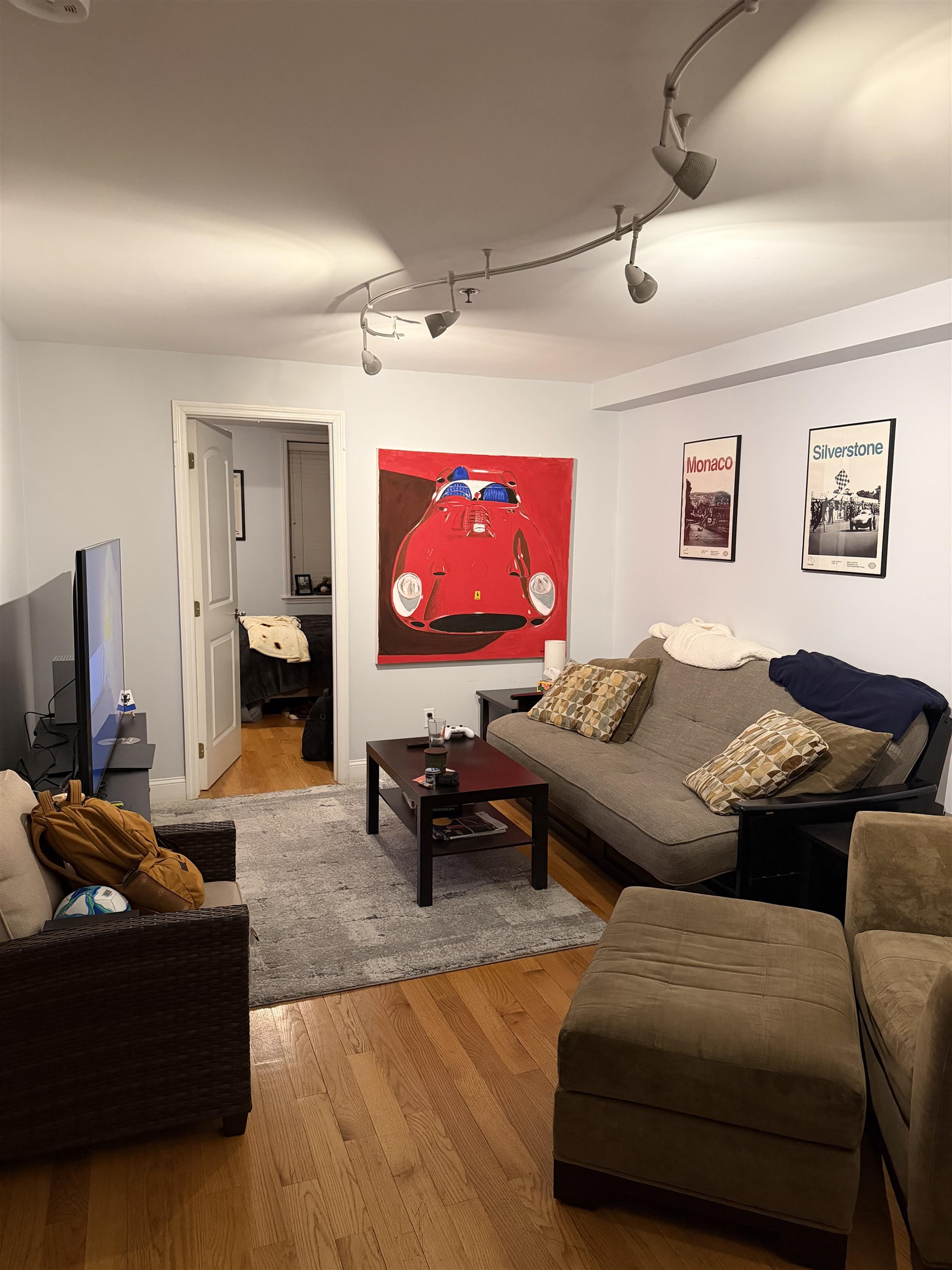 528 Garden Street, Unit B Hoboken, NJ 07030 - Photo 6 of 13 a living room with furniture and a flat screen tv