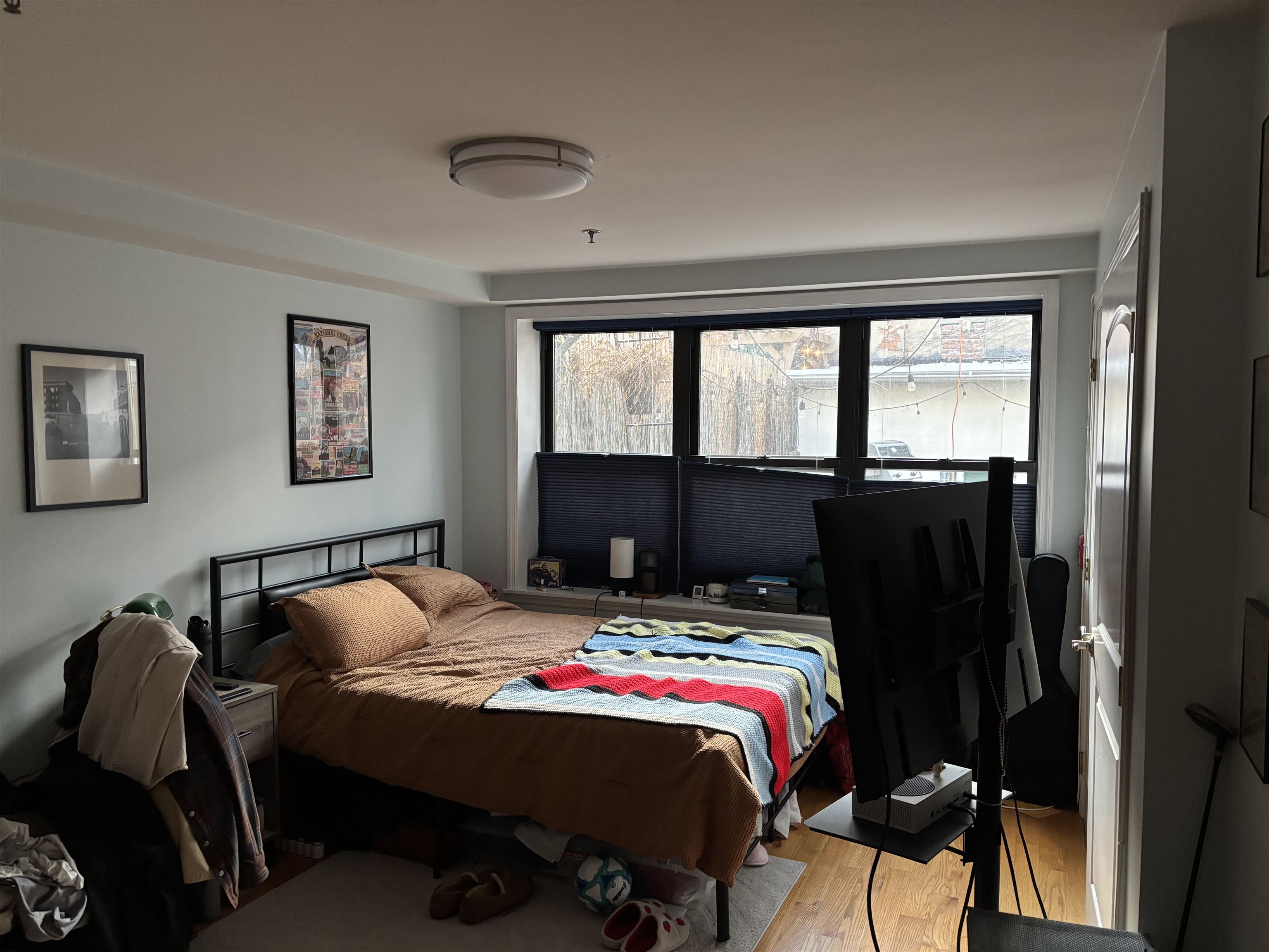 528 Garden Street, Unit B Hoboken, NJ 07030 - Photo 8 of 13 a bedroom with a bed and a window
