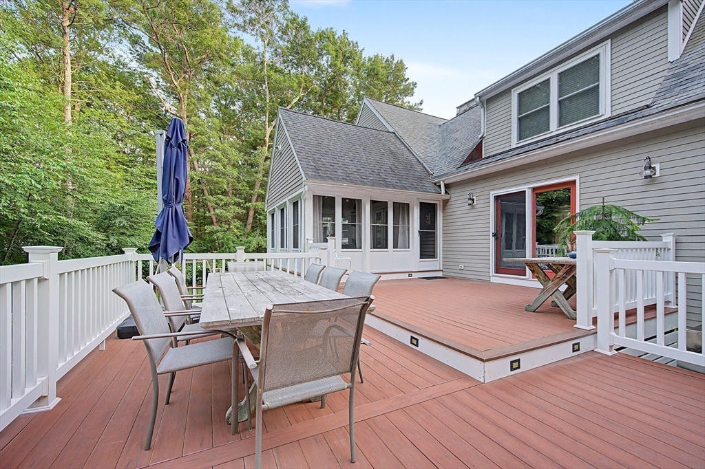 4 Dicarlo Road Hopkinton, MA 01748 - Photo 34 of 41 a view of house with a deck and furniture