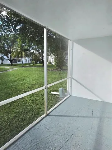 a view of a trees in front of a house