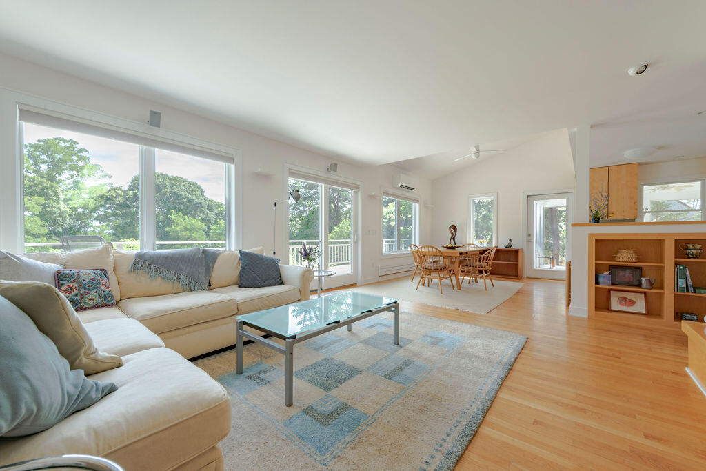 10 Hamblen Farm Road Wellfleet, MA 02667 - Photo 12 of 59 a living room with furniture and a fireplace