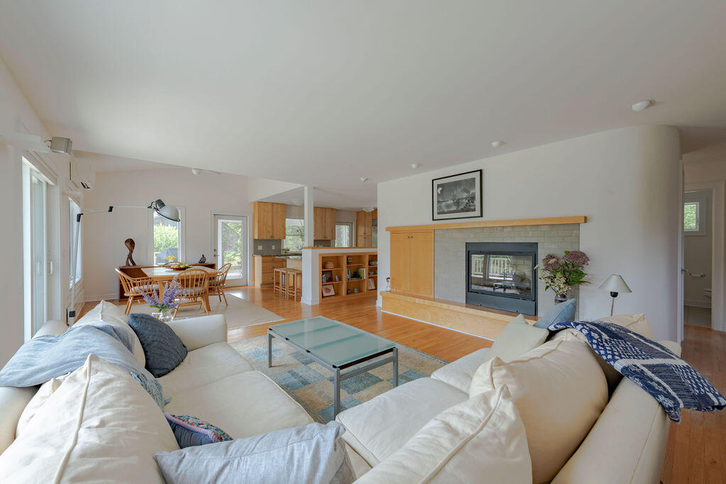 10 Hamblen Farm Road Wellfleet, MA 02667 - Photo 15 of 59 a living room with furniture and a fireplace