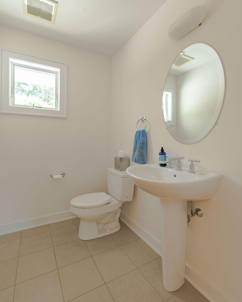 10 Hamblen Farm Road Wellfleet, MA 02667 - Photo 16 of 59 a bathroom with a sink a toilet and mirror
