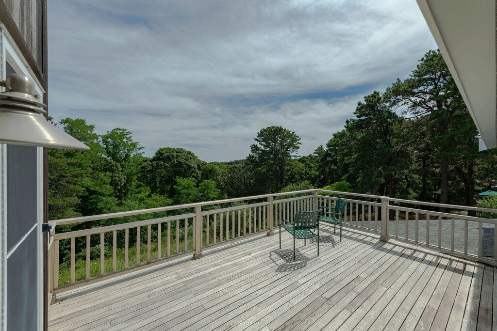 10 Hamblen Farm Road Wellfleet, MA 02667 - Photo 32 of 59 a view of balcony with wooden floor and fence