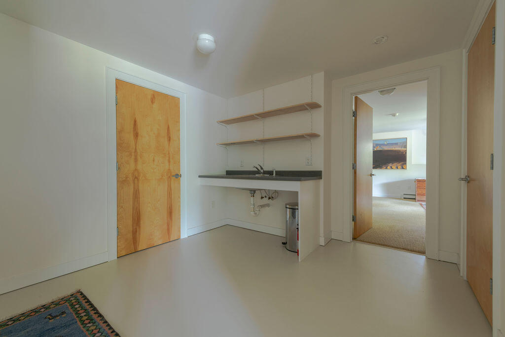 10 Hamblen Farm Road Wellfleet, MA 02667 - Photo 36 of 59 a view of an empty room and fire place