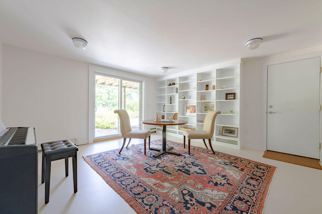 10 Hamblen Farm Road Wellfleet, MA 02667 - Photo 37 of 59 a view of a workspace with furniture and a window